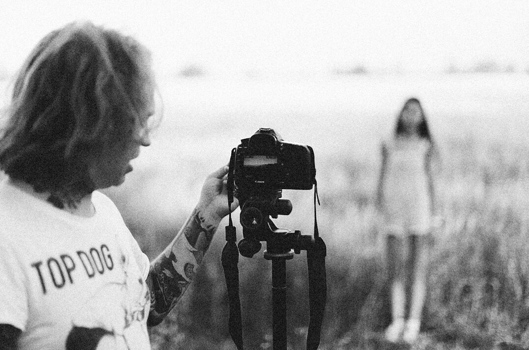 Portrait of a female photojournalist and interviewer