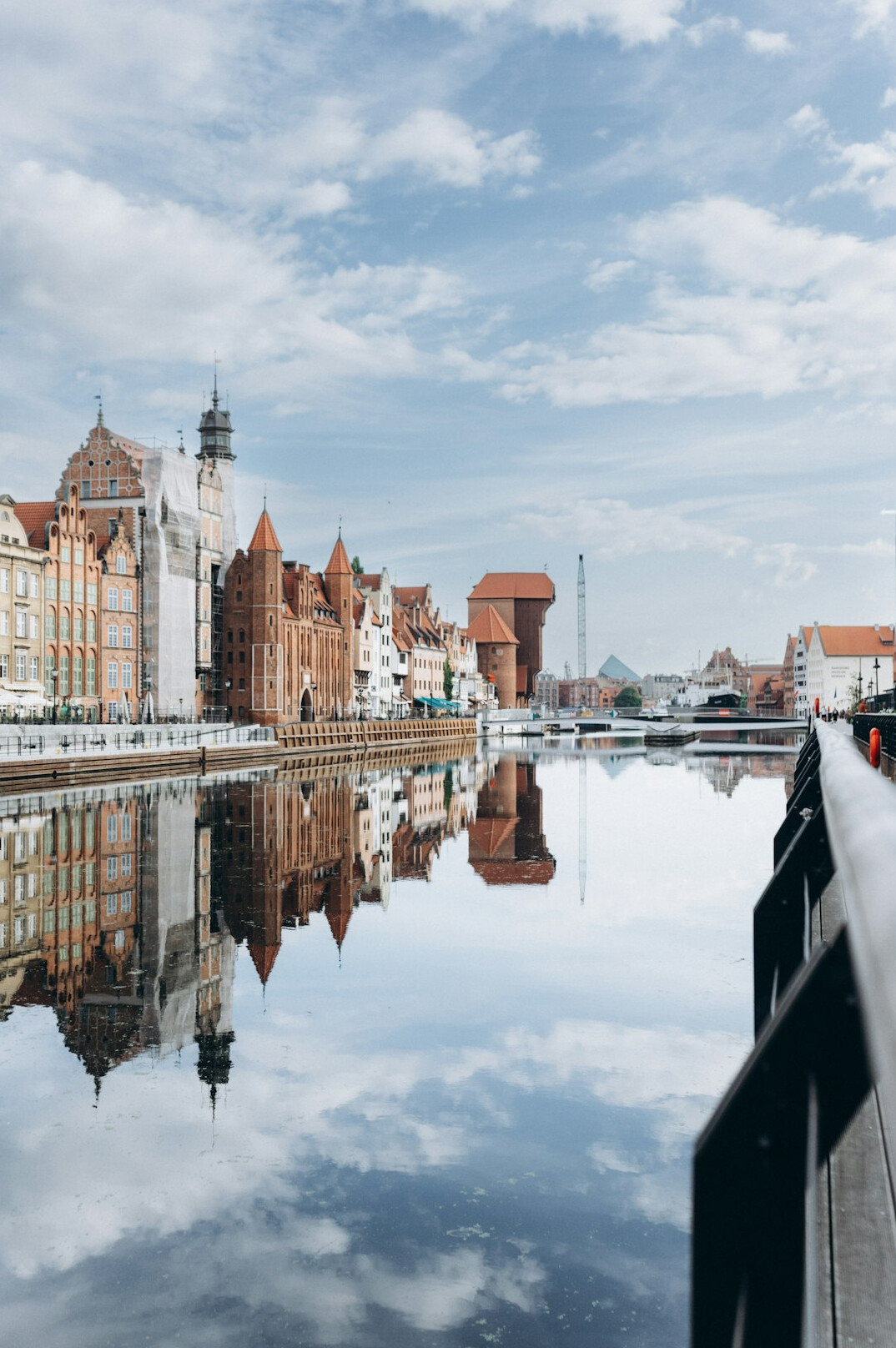 Riverside view of a small Polish town skyline