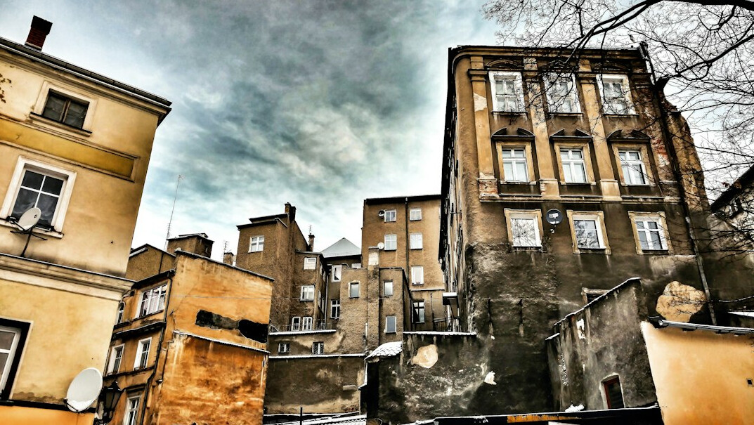 Courtyard of an old tenement building in a Polish city